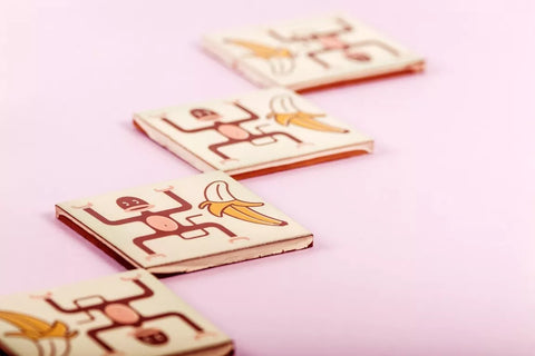 Set 4 posavasos de cerámica «Monos y plátanos»